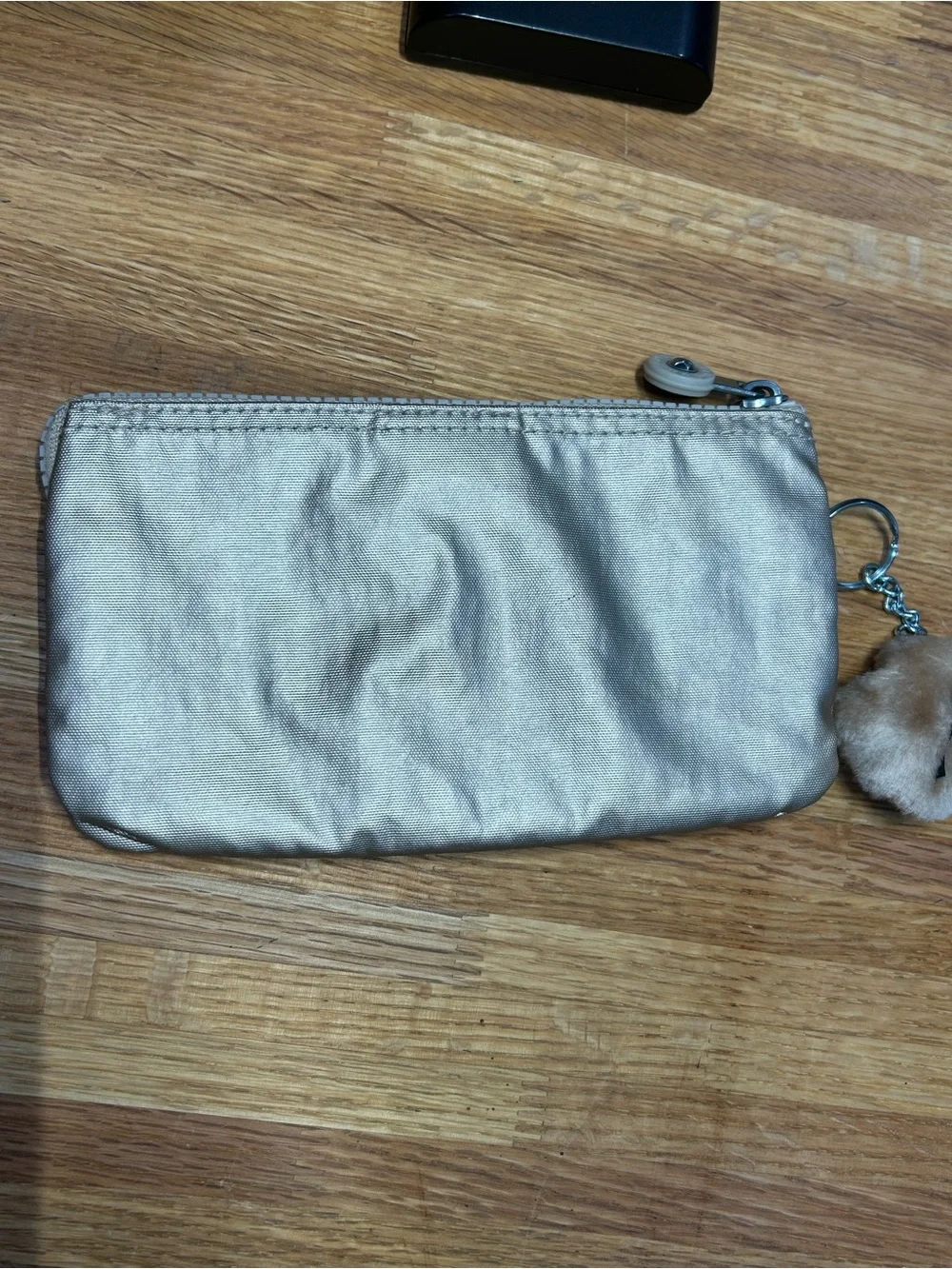 Kipling Metallic Silver Cosmetic Pouch with Monkey Charm